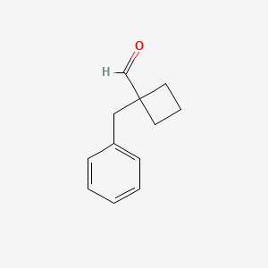 1-Benzylcyclobutane-1-carbaldehyde