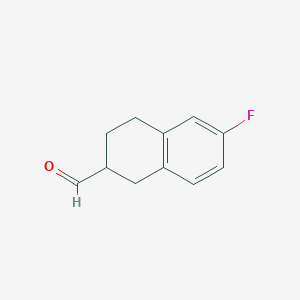 molecular formula C11H11FO B13234247 6-Fluoro-1,2,3,4-tetrahydronaphthalene-2-carbaldehyde 