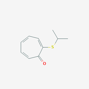 molecular formula C10H12OS B13235794 2-(Propan-2-ylsulfanyl)cyclohepta-2,4,6-trien-1-one 