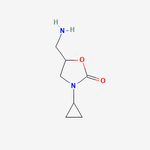 molecular formula C7H12N2O2 B13239906 5-(Aminomethyl)-3-cyclopropyl-1,3-oxazolidin-2-one 