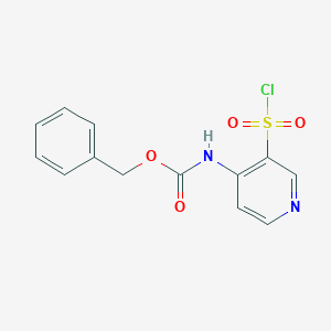 molecular formula C13H11ClN2O4S B13242063 Benzyl N-[3-(chlorosulfonyl)pyridin-4-yl]carbamate 