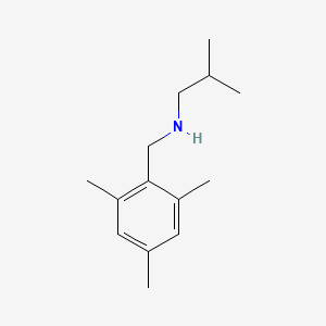 molecular formula C14H23N B13247896 (2-Methylpropyl)[(2,4,6-trimethylphenyl)methyl]amine 