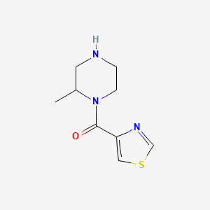 molecular formula C9H13N3OS B13248884 2-Methyl-1-(1,3-thiazole-4-carbonyl)piperazine 