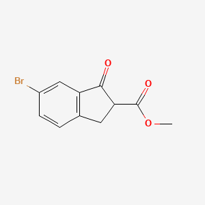 methyl 6-bromo-1-oxo-2,3-dihydro-1H-indene-2-carboxylate