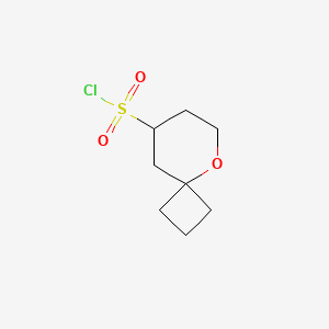 molecular formula C8H13ClO3S B13251214 5-Oxaspiro[3.5]nonane-8-sulfonyl chloride 