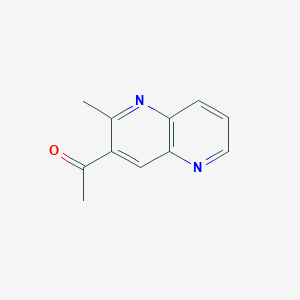 molecular formula C11H10N2O B13251773 1-(2-Methyl-1,5-naphthyridin-3-yl)ethan-1-one 