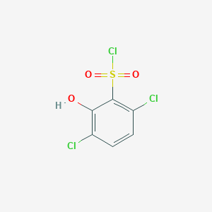 molecular formula C6H3Cl3O3S B13253184 3,6-Dichloro-2-hydroxybenzene-1-sulfonyl chloride 