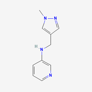 molecular formula C10H12N4 B13253492 N-[(1-methyl-1H-pyrazol-4-yl)methyl]pyridin-3-amine 