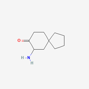 molecular formula C10H17NO B13253649 7-Aminospiro[4.5]decan-8-one 