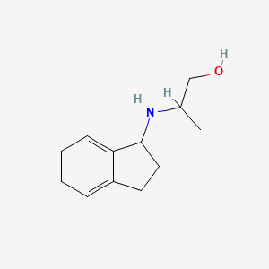 molecular formula C12H17NO B13254791 2-[(2,3-dihydro-1H-inden-1-yl)amino]propan-1-ol 