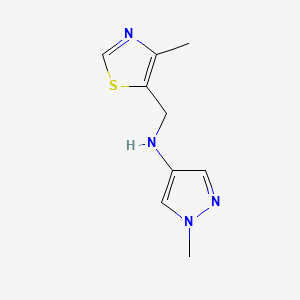 molecular formula C9H12N4S B13256513 1-methyl-N-[(4-methyl-1,3-thiazol-5-yl)methyl]-1H-pyrazol-4-amine 