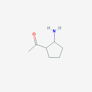 molecular formula C7H13NO B13257959 1-(2-Aminocyclopentyl)ethan-1-one 