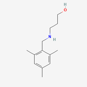 3-{[(2,4,6-Trimethylphenyl)methyl]amino}propan-1-ol