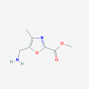 molecular formula C7H10N2O3 B13265216 Methyl 5-aminomethyl-4-methyl-oxazole-2-carboxylate 