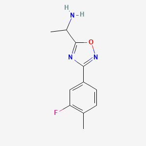 molecular formula C11H12FN3O B13269485 1-[3-(3-Fluoro-4-methylphenyl)-1,2,4-oxadiazol-5-yl]ethan-1-amine 