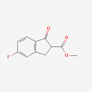 molecular formula C11H9FO3 B13269596 methyl 5-fluoro-1-oxo-2,3-dihydro-1H-indene-2-carboxylate 