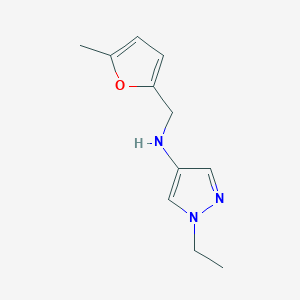 molecular formula C11H15N3O B13270299 1-Ethyl-N-[(5-methylfuran-2-yl)methyl]-1H-pyrazol-4-amine 