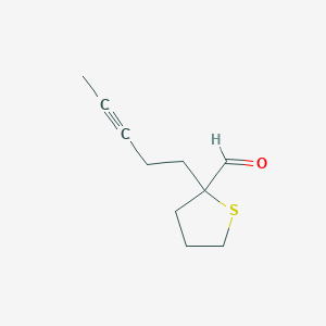 2-(Pent-3-yn-1-yl)thiolane-2-carbaldehyde