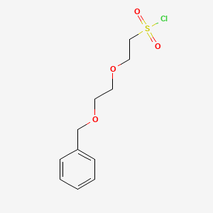 2-[2-(Benzyloxy)ethoxy]ethane-1-sulfonyl chloride