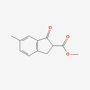 1H-Indene-2-carboxylic acid, 2,3-dihydro-1-oxo-6-methyl-, methyl ester