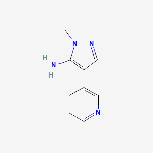 molecular formula C9H10N4 B13277313 1-methyl-4-(pyridin-3-yl)-1H-pyrazol-5-amine 