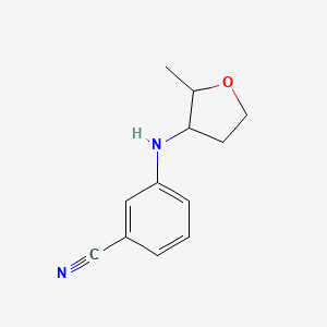 molecular formula C12H14N2O B13282179 3-[(2-Methyloxolan-3-yl)amino]benzonitrile 