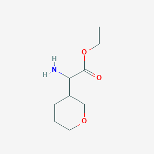 Ethyl 2-amino-2-(oxan-3-yl)acetate