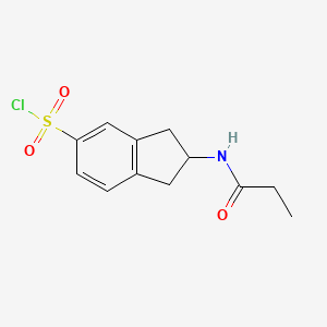 molecular formula C12H14ClNO3S B13285592 2-Propanamido-2,3-dihydro-1H-indene-5-sulfonyl chloride 