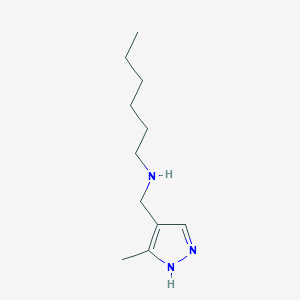 molecular formula C11H21N3 B13287056 Hexyl[(3-methyl-1H-pyrazol-4-yl)methyl]amine 