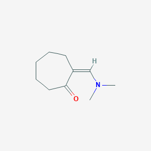 2-[(Dimethylamino)methylidene]cycloheptan-1-one