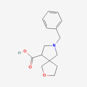 7-Benzyl-2-oxa-7-azaspiro[4.4]nonane-9-carboxylic acid