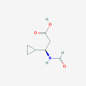 molecular formula C7H11NO3 B13289388 (3R)-3-Cyclopropyl-3-formamidopropanoic acid 