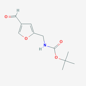 molecular formula C11H15NO4 B13289846 tert-Butyl N-[(4-formylfuran-2-yl)methyl]carbamate 