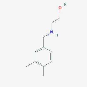 2-{[(3,4-Dimethylphenyl)methyl]amino}ethan-1-ol