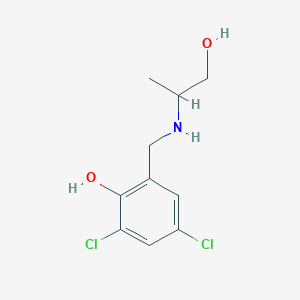 molecular formula C10H13Cl2NO2 B13290399 2,4-Dichloro-6-{[(1-hydroxypropan-2-yl)amino]methyl}phenol 