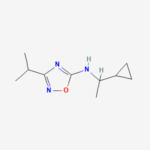 molecular formula C10H17N3O B13290647 N-(1-Cyclopropylethyl)-3-(propan-2-yl)-1,2,4-oxadiazol-5-amine 