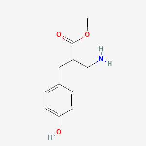 molecular formula C11H15NO3 B13291601 Methyl 3-amino-2-[(4-hydroxyphenyl)methyl]propanoate 