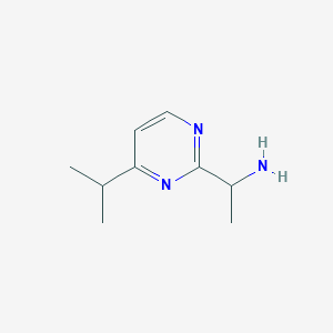 molecular formula C9H15N3 B13300275 1-[4-(Propan-2-yl)pyrimidin-2-yl]ethan-1-amine 