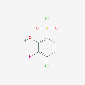 molecular formula C6H3Cl2FO3S B13301424 4-Chloro-3-fluoro-2-hydroxybenzene-1-sulfonyl chloride 