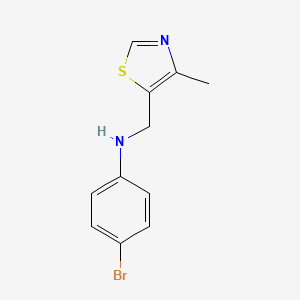 molecular formula C11H11BrN2S B13302048 4-bromo-N-[(4-methyl-1,3-thiazol-5-yl)methyl]aniline 