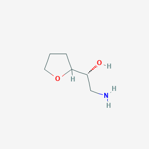 (1R)-2-Amino-1-(oxolan-2-yl)ethan-1-ol