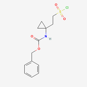 Benzyl N-{1-[2-(chlorosulfonyl)ethyl]cyclopropyl}carbamate