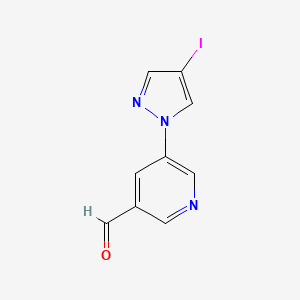 molecular formula C9H6IN3O B13307766 5-(4-Iodo-1H-pyrazol-1-yl)pyridine-3-carbaldehyde 