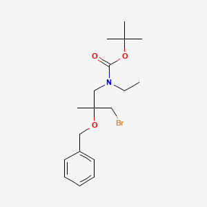 tert-Butyl N-[2-(benzyloxy)-3-bromo-2-methylpropyl]-N-ethylcarbamate