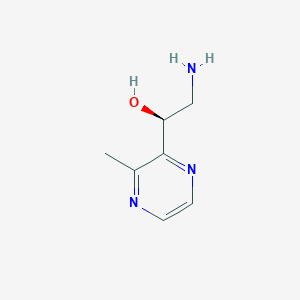 molecular formula C7H11N3O B13309052 (1S)-2-Amino-1-(3-methylpyrazin-2-yl)ethan-1-ol 