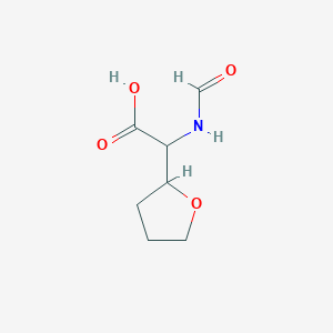 molecular formula C7H11NO4 B13310831 2-Formamido-2-(oxolan-2-yl)acetic acid 