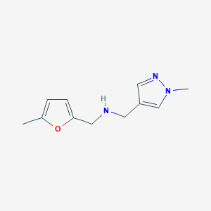 molecular formula C11H15N3O B13311052 [(1-Methyl-1H-pyrazol-4-yl)methyl][(5-methylfuran-2-yl)methyl]amine CAS No. 1006959-26-7