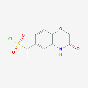 1-(3-Oxo-3,4-dihydro-2H-1,4-benzoxazin-6-yl)ethane-1-sulfonyl chloride