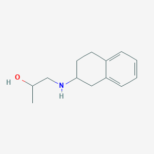 molecular formula C13H19NO B13311483 1-[(1,2,3,4-Tetrahydronaphthalen-2-yl)amino]propan-2-ol 