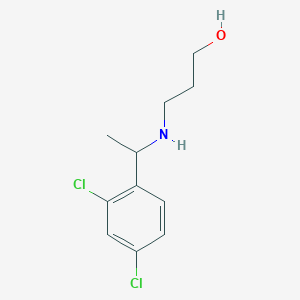 molecular formula C11H15Cl2NO B13311998 3-{[1-(2,4-Dichlorophenyl)ethyl]amino}propan-1-ol 